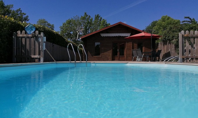 Vaunac Ski Chalet | Chalet with private pool overlooking meadow and woodland
