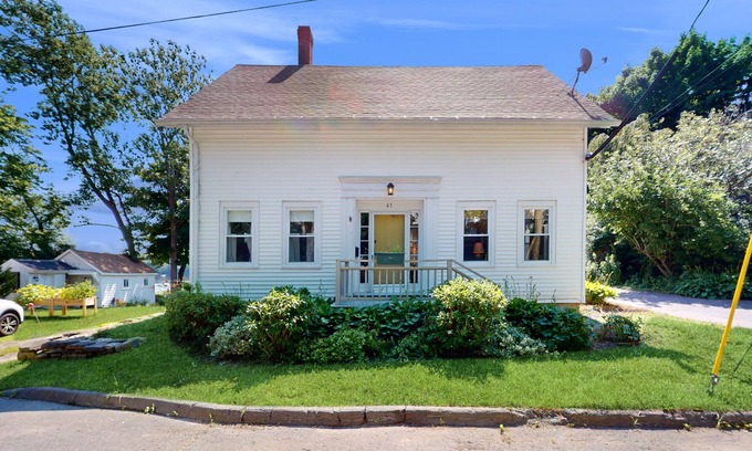 Bath House | Charming Cape-style House with Panoramic River Views and Modern Amenities