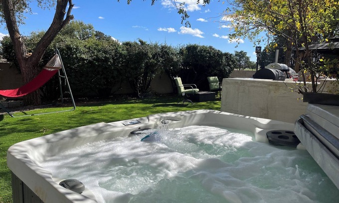 Prescott Cottage | Charming Casita with a fireplace, and a private patio and golf course views.