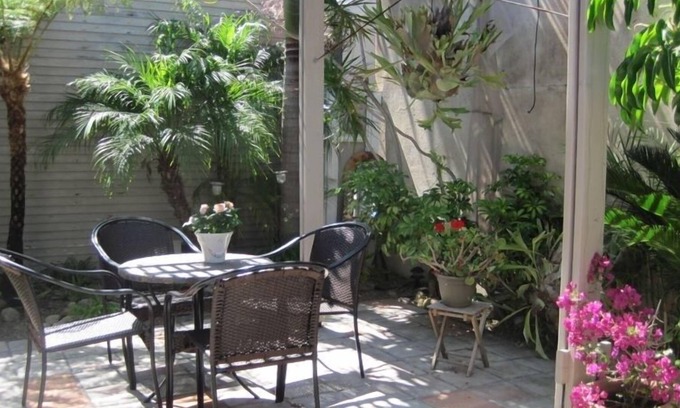 North Park Cottage | Charming Cottage W/ Garden is Idyllic Retreat in Urban Setting