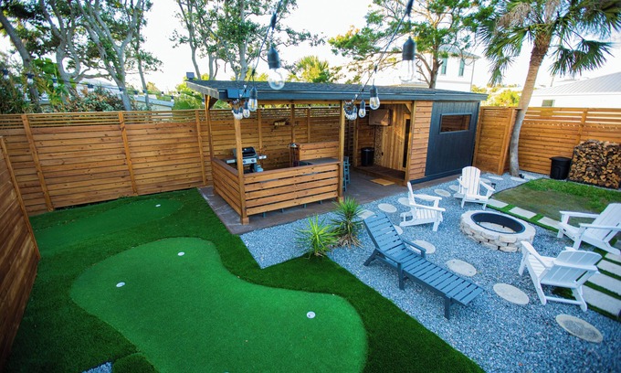 Butler Beach Cottage | Charming Cottage with Sauna, MINI Golf, 2 OD Showers, Firepit, 2 Tubs and more!