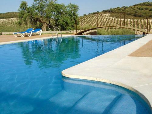 Estepa House | Charming house in Estepa with shared pool.
