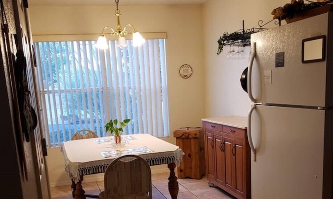 Westside House | Cheerful NM style home with indoor fireplace