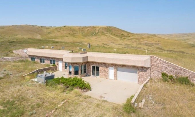 Owanka House | Cheyenne River Ranch 4BR Earth Sheltered Home with Hot Tub! by RedAwning