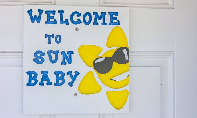 Gulf Shores Cottage | Chic 2BR Getaway with Pool & Balcony Just Steps from the Sand