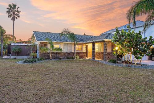 Palm Harbor House | Coastal Canal Front Retreat with Pool & Hot Tub