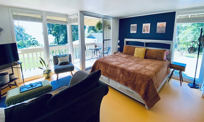 Daphne Condo | Color Me Crazy Eclectic Studio with Bay Views!