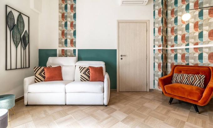 Historic Center Apartment | Colorful apartment in Riva di Reno by Wonderful Italy