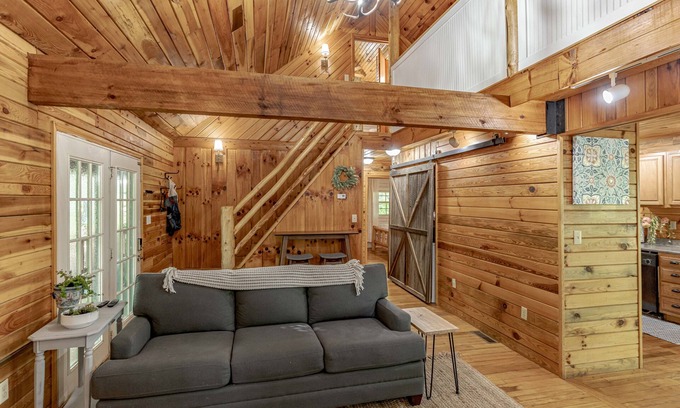 Rogers Cottage | Come relax in our cozy cottage nestled in the woods overlooking Lake Millie.