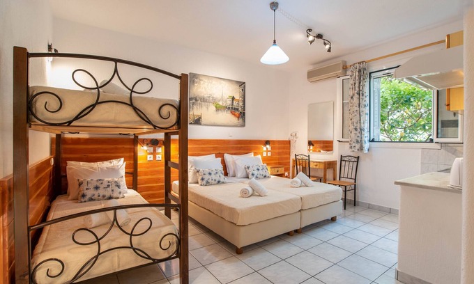 Paros Apartment | Comfort Room 28 m² (3-4 Adults) - Semi Basement near Livadia Beach 300m.