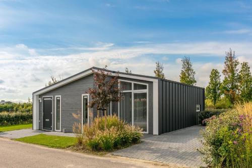 Wemeldinge House | Comfortabel en modern ingericht huis met Tuin met 2 terrassen 80