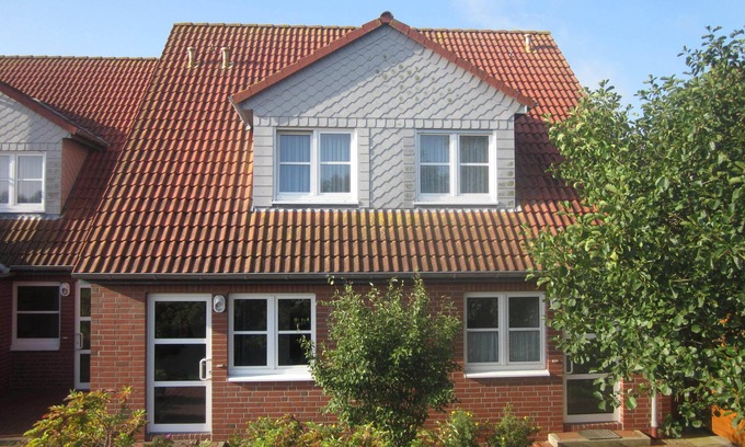 Borkum House | Comfortable holiday center house with its own garden directly at the nature reserve