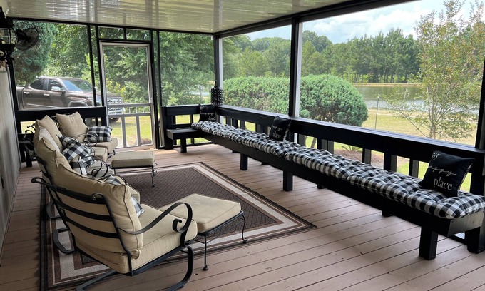 Moultrie House | Completely renovated mobile home sitting own a pond.