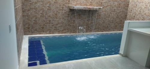 Carmen de Apicala House | conjunto residencial aquapark las tres palmas