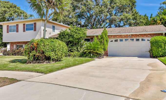 Bay Crest Park House | Conveniently located home with pool, Ping-Pong, screened patio, grills, & W/D