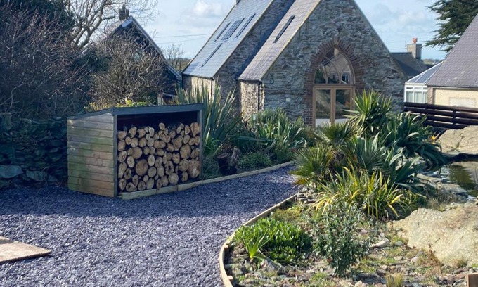 Amlwch House | Converted chapel - Sant Pedr Newydd - with sea views