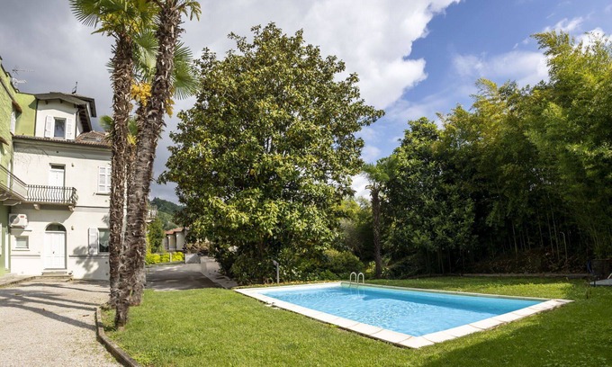 Meina Apartment | Cosy apartment for 4 guests with A/C, pool, TV and balcony