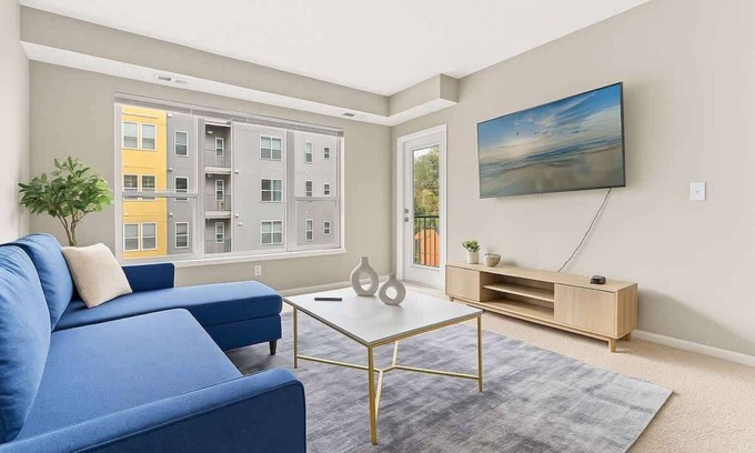 West Seventh Apartment | Cozy 2BR | King + 2 Queens + Walk to Xcel Arena