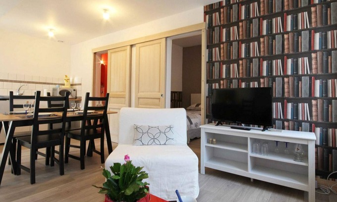 Segrie-Fontaine Apartment | Cozy Apartment Above Café Bookstore with Garden and Electric Bike Rentals