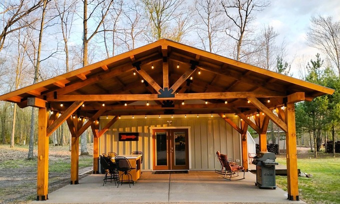 Spooner Cottage | Cozy cabin offers four seasons of fun! Recreate & relax on Mystery Lake!