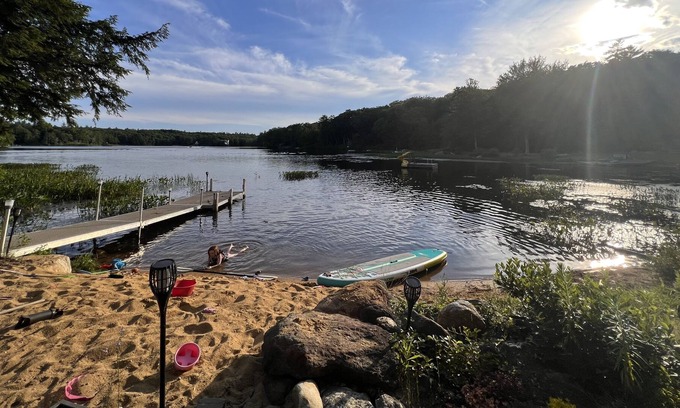 Barnstead House | Cozy home with private beach on Huntress Pond and short drive to skiing!