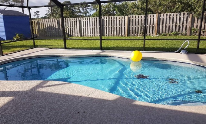 Port Saint Lucie House | Cozy Port St Lucie getaway. Lanai Plus Private Heated Pool & Private Gardens
