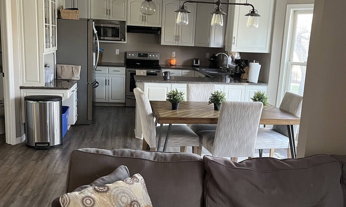Oshkosh House | Cozy private relaxing home near EAA grounds with fenced in yard and hot tub