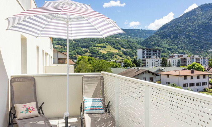 Cluses Condo | Cozy, Spacious condo with balcony and beautiful serene mountain views.