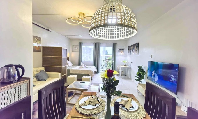 Puerto Princesa City Centre Condo | Cozy Studio with Balcony Near Airport Smart Lock Netflix Verdant Palawan