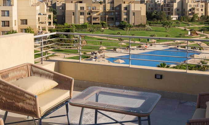 6th of October City Apartment | Cozy studio with Pool View, WiFi and AC in serene Palm Parks
