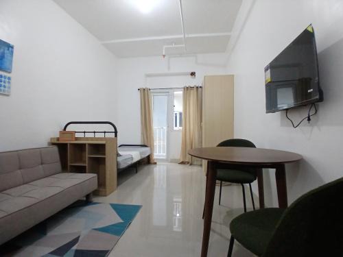 South Triangle Apartment | Cozy Urban Retreat at Victoria De Morato