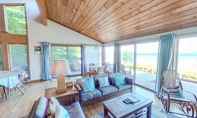 Frankfort Cabin | Crystal Lake retreat w/terrific lake views, private waterfront, firepit, 2 bikes