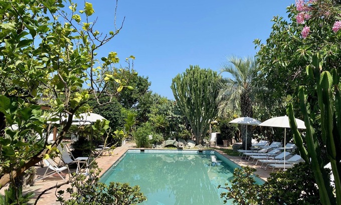 Succhivo Apartment | "Cypress cottage" with garden, swimming pool and spa hot tub