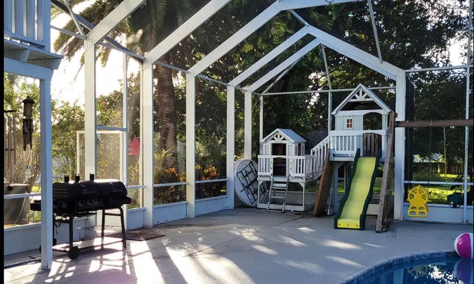 Daytona Beach House | Daytona Beach pool, playset, GAME ROOM hot tub, 5 bedroom home