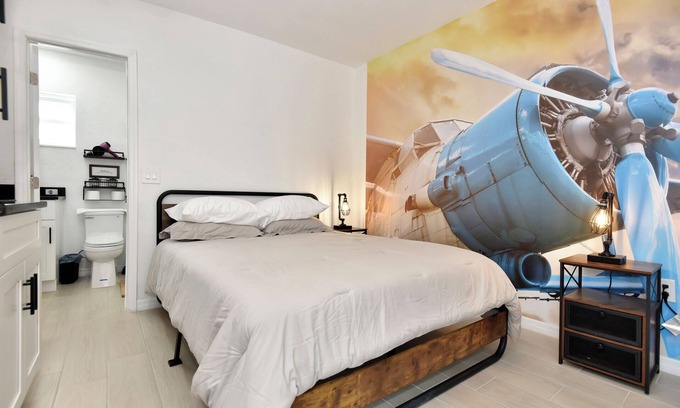 Daytona Beach Shores Hotel | Daytona Studio suite Queen bed kitchen walk in shower #3