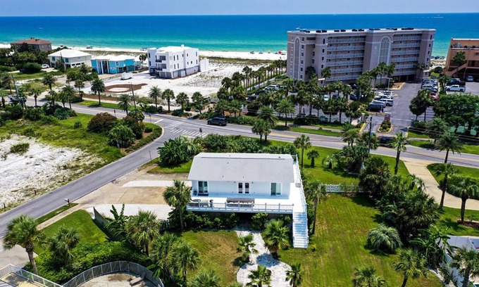 Holiday Isle House | Deep water access w/65ft inland slip! Private Beach access! Water Taxi!