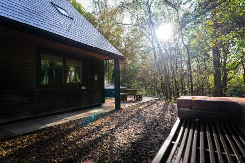 Farley House | Denstone, woodland lodge with hot tub for 8