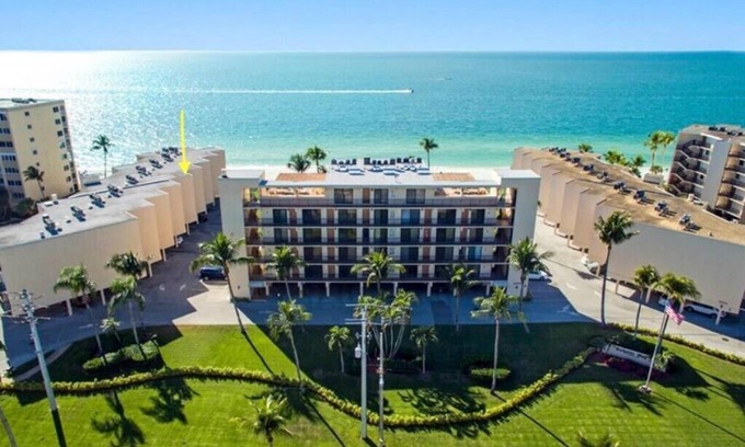 Bonita Springs Condo | Directly on the BEACH! Million dollar view of the ocean! Swim, walk or relax!