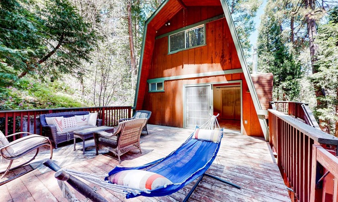 Crestline House | Dog-friendly 2-story home with large deck, tree views, fireplace, hammock, & W/D