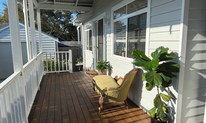 Arrawarra Headland Apartment | Dog friendly apartment close to beaches. Own private yard, garden and 2 decks.