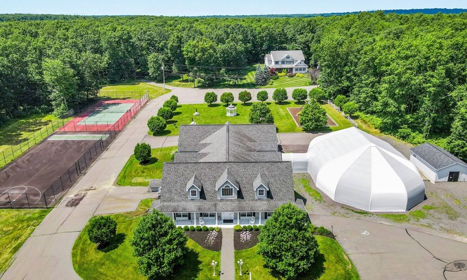 Blakeslee House | Dog-friendly house near skiing with fireplace, upscale kitchen & pool access