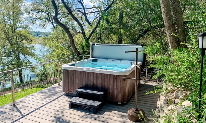 Point Pedernales House | Dog-friendly riverfront home with dock, private hot tub, game room, amazing view