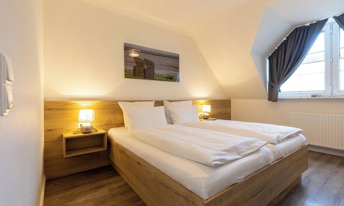 Dorumer Neufeld Apartment | Double room 115. Cozy and dog-friendly.