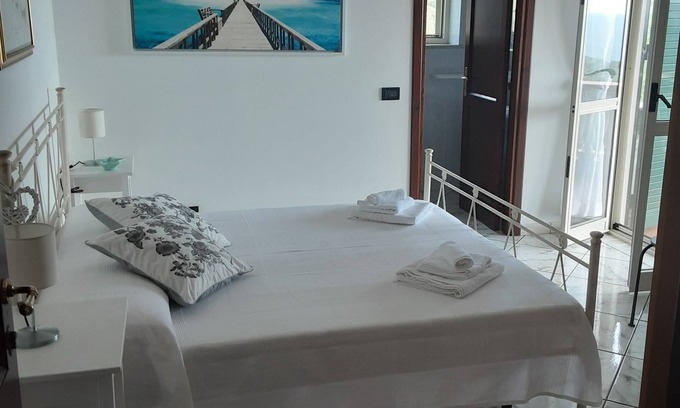 Marina Di Camerota Apartment | Double room with bathroom, small terrace with sea view