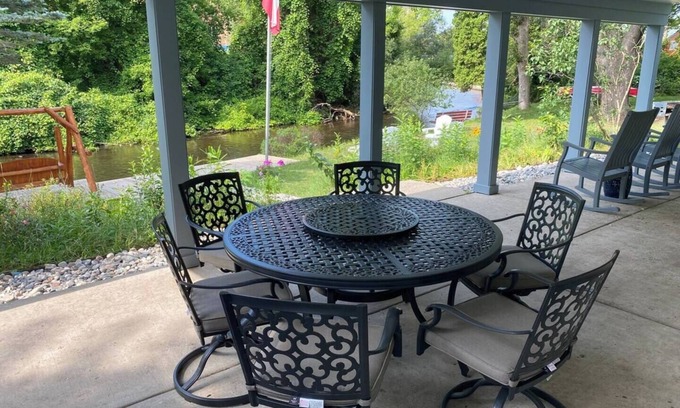 Grayling House | Downtown Grayling Riverfront Retreat-Welcome Hunters, Walk to Shops & Dining