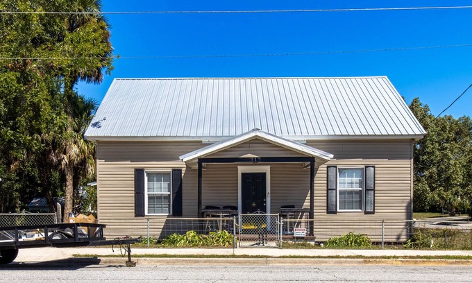 Lake City House | Downtown three bedroom house with game room and outside lounging area.