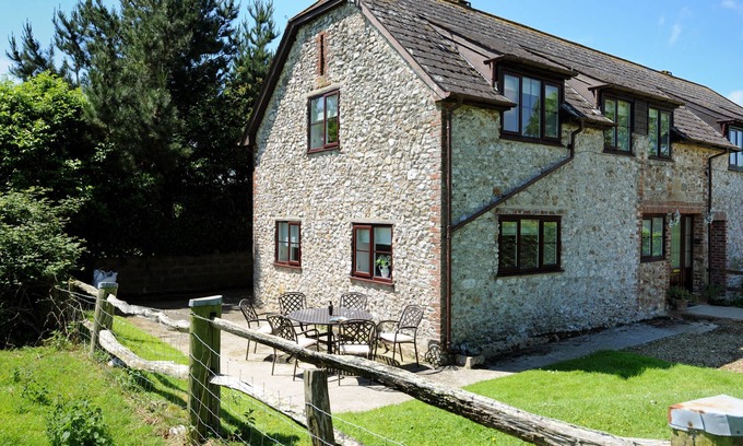 Bridport House | EAST BARN, pet friendly, with a garden in Charmouth