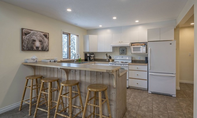 Silver Star Mountain House | Easy ski-in and ski out from this home with private hot tub, laundry & fireplace