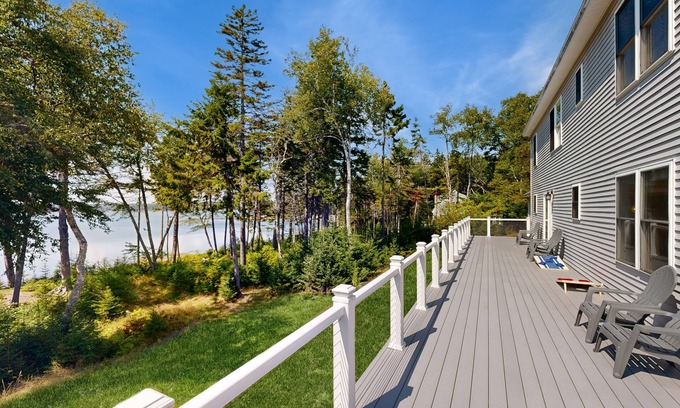 Steuben House | Elegant, spacious coastal home with sunset ocean views from an inviting deck