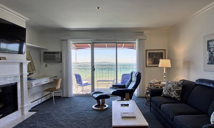 Boyne City Condo | Elevated Lake Charlevoix Views | Private Balcony & Beach Access | Fireplace |